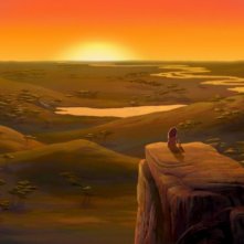 Simba e Mufasa guardano il panorama al tramonto in una scena del film Il re leone 3D