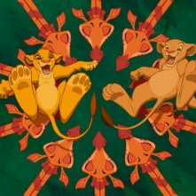 Simba e Nala giocano con le loro amiche giraffe in una scena de Il re leone 3D