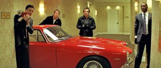 Casey Affleck, Matthew Broderick, Ben Stiller e Eddie Murphy in una divertente scena di Tower Heist: Colpo ad alto livello