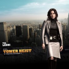 Téa Leoni in un character wallpaper del film Tower Heist: Colpo ad alto livello