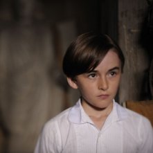 Il piccolo Isaac Hempstead-Wright in una scena del film 1921 - Il mistero di Rookford