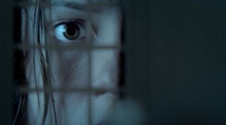 Un'inquietante immagine di Rebecca Hall tratta dal film 1921 - Il mistero di Rookford