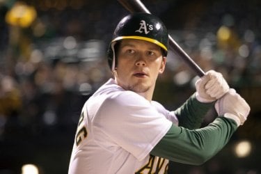 Moneyball: Chris Pratt in azione sul campo in una scena del film