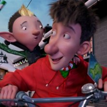Arthur Christmas: Il figlio di Babbo Natale in 3D, il piccolo Arthur in bici con il suo amichetto sulla slitta in una scena del film