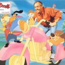 Don Bluth, con i protagonisti di Eddy e la banda del sole luminoso, in una immagine promozionale