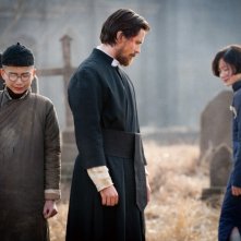 Christian Bale E John Miller In Una Scena Del Film The Flowers Of War 227537