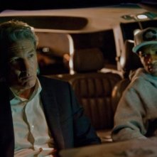 Richard Gere in una scena del thriller Arbitrage insieme a Nate Parker