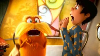 Lorax insieme al giovane Onceler in una scena del film Lorax - Il guardiano della foresta
