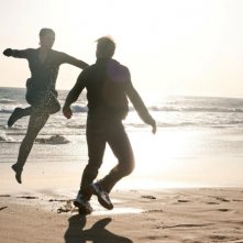 Gina Carano insieme ad Ewan McGregor in una scena d'azione del film Knockout - Resa dei conti