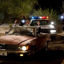 Topher Grace Dan Fogler Michael Biehn Ed Edwin Hodge In Una Scena Di Take Me Home Tonight 231213