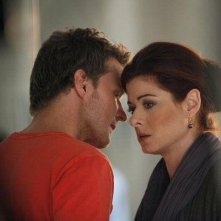 Will Chase e Debra Messing in una foto di scena del sesto episodio di Smash