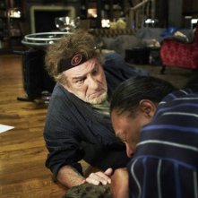 Eddy Mitchell in una scena de L'oncle Charles