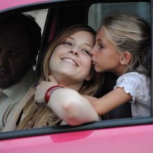 Amore liquido: Stefano Fregni, Sara Sartini e la piccola Martina Capannini in una scena del film