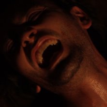 La casa nel vento dei morti: Luca Magri in una drammatica scena del film durante una tortura