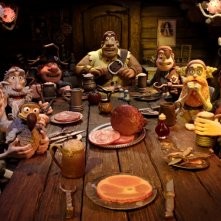 Pirati! Briganti da strapazzo: la ciurma riunita per la cena in una scena del film