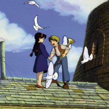 Pazu e Sheeta sul tetto insieme ai colombi in una scena del film Il castello nel cielo