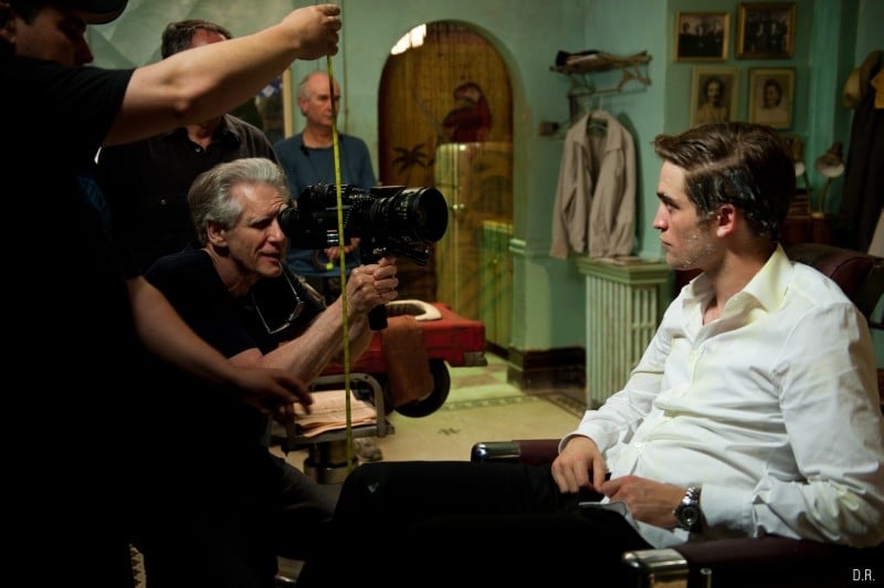 Cosmopolis: il regista David Cronenberg insieme a Robert Pattinson sul set del film