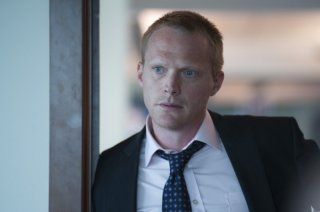 Margin Call: un'espressione preoccupata di Paul Bettany tratta dal film
