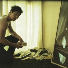 Taste of Money: Kim Kang-woo in una scena del film