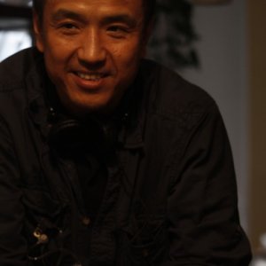 Mystery: il regista Lou Ye sorride sul set del film