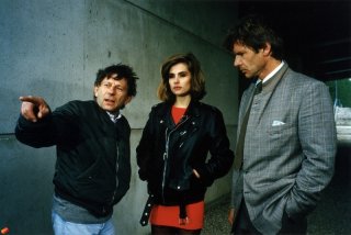 Roman Polanski: A Film Memoir, un'immagine di Roman Polanski sul set di Frantic, insieme a Harrison Ford ed Emmanuelle Seigner