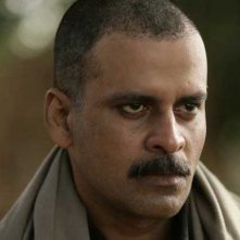 Gangs of Wasseypur: Manoj Bajpayee in una scena del film