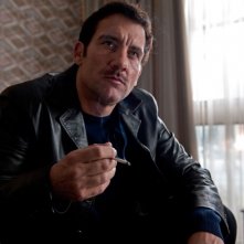 Clive Owen in una scena dell'action movie Killer Elite