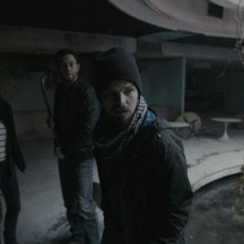 Chernobyl Diaries: Nathan Phillips, Jonathan Sadowski e Devin Kelley in una scena del film