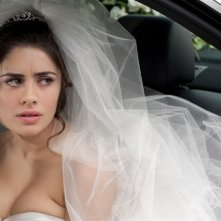 Qualche nuvola: Greta Scarano è una sposa dallo sguardo triste in una scena del film