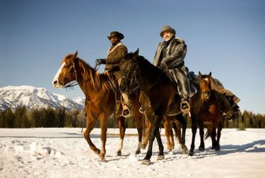 Christoph Waltz e Jamie Foxx attraversano le pianure innevate in Django Unchained