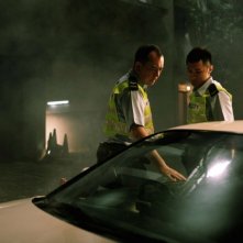 Motorway: Xiaodong Guo e Anthony Wong Chau-Sang in una scena dell'action poliziesco