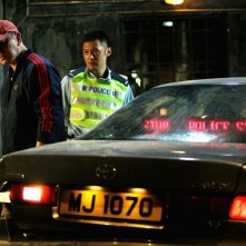 Motorway: Xiaodong Guo insieme a Anthony Wong Chau-Sang in una scena dell'action diretto da Pou-Soi Cheang