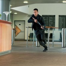 Joseph Gordon-Levitt in azione in una scena di Il cavaliere oscuro - Il ritorno