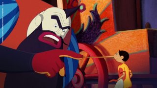 Pinocchio: Mangiafuoco e Pinocchio in una scena del film di Enzo d'Alò