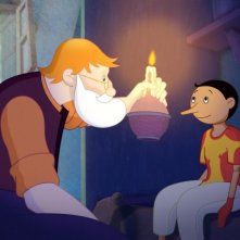 Pinocchio: Mastro Geppetto con il suo Pinocchio in una scena del film di Enzo d'Alò