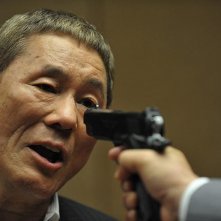 Outrage Beyond: il regista e interprete del film Takeshi Kitano in una scena del film