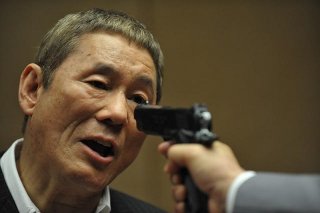 Outrage Beyond: il regista e interprete del film Takeshi Kitano in una scena del film
