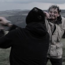 Stan Rowe in una sequenza di Harold's Going Stiff