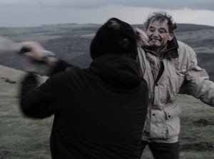 Stan Rowe in una sequenza di Harold's Going Stiff