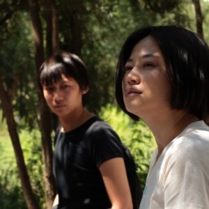 Lotus: Tan Zhuo in una scena del film insieme a Guo Zhongyu