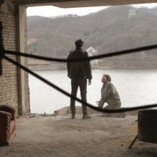 Pietà: lo spietato Lee Jung-jin con una delle sue vittime in una scena del film