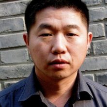 Three Sisters: il regista Wang Bing in una foto promozionale