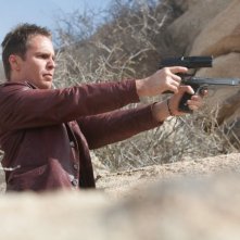 Sam Rockwell in azione in una scena di 7 psicopatici