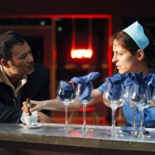 Simon Yam con Audrey Dana in Les jeux des nuages et de la pluie