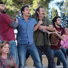 Buongiorno papà: Marco Giallini con Edoardo Leo e Raoul Bova sugli spalti in un'immagine del film