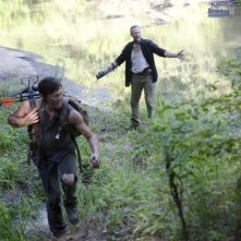 The Walking Dead: Norman Reedus e Michael Rooker in una scena dell'episodio Bentornato a casa