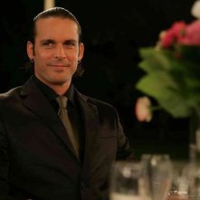 AmeriQua: Enrico Silvestrin in una scena nei panni di Carmine