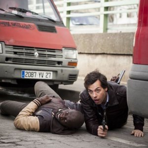 Due agenti molto speciali: Omar Sy e Laurent Lafitte in una scena d'azione del film