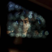 La città ideale: Luigi Lo Cascio in trasparenza in una suggestiva immagine tratta dal film