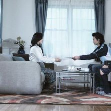 Confessions: Yoshino Kimura, Masaki Okada e Ai Hashimoto in una scena del film